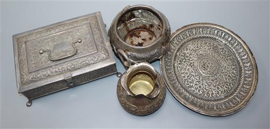 Four Indian white metal items including a trinket box, jug, bowl and dish.